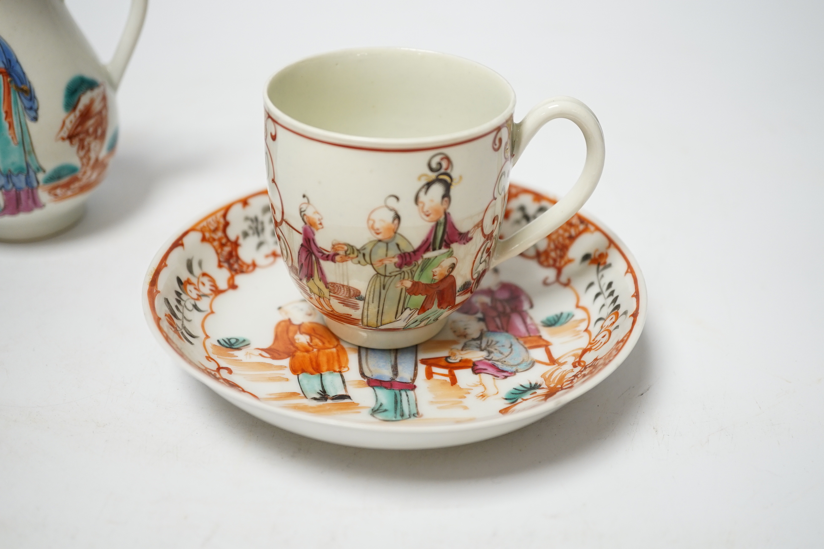 A Worcester sparrowbeak jug and a similar coffee cup together with an 18th century Chinese export saucer, 13cm diameter